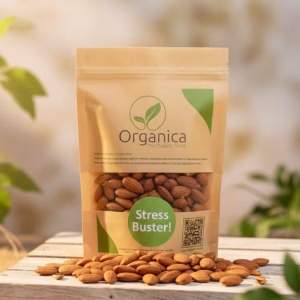 Organica The Organic Store kraft paper pouch containing premium baked almonds labeled 'Stress Buster', displayed on natural stacked wooden platforms with a soft, sunlit organic background."